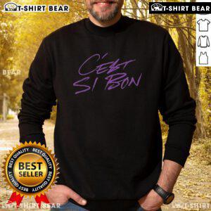 Stylish Top Say She She C'est Si Bon sweatshirt in vibrant colors, perfect for casual wear and fashion lovers.