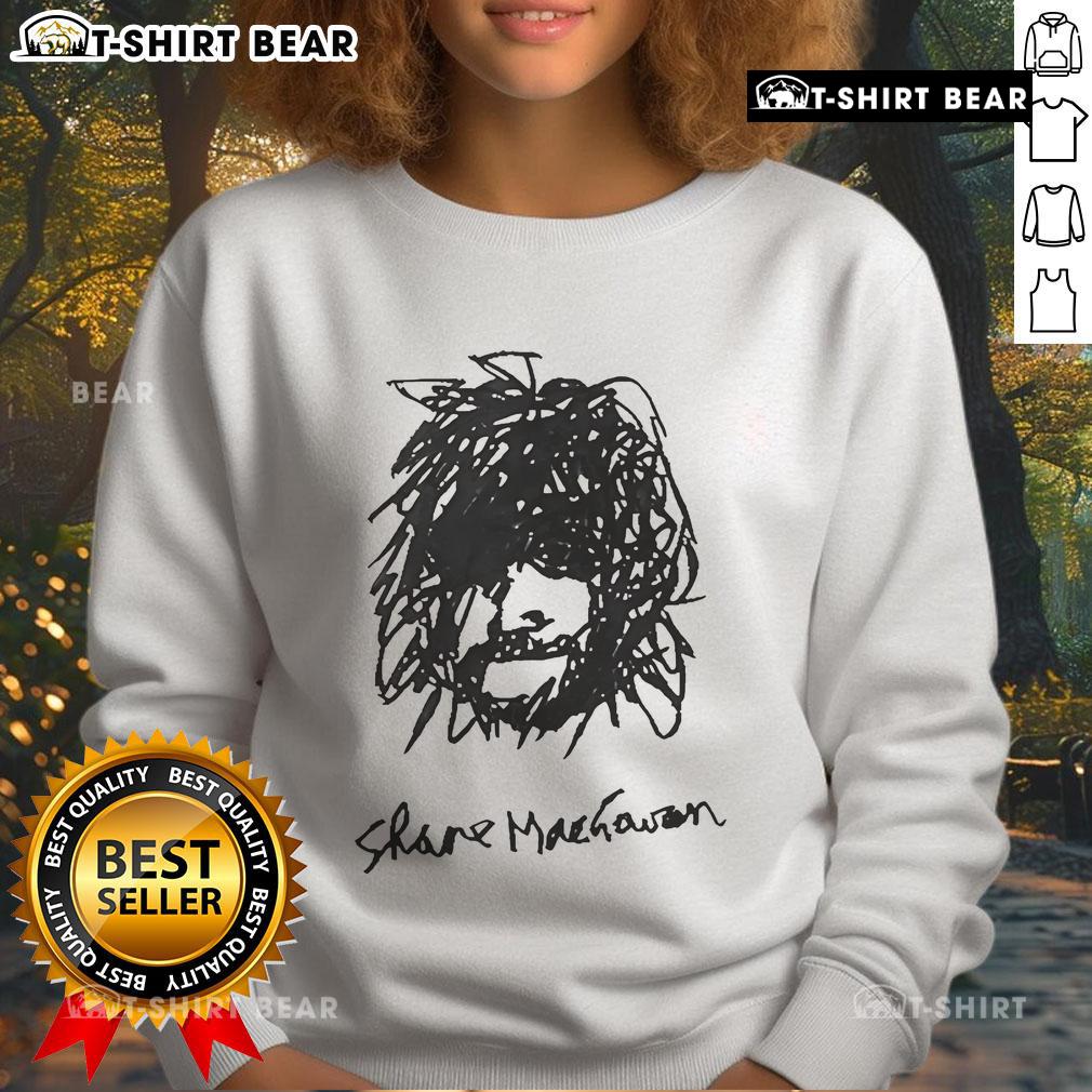 Alt Text: Top Shane MacGowan self-portrait sweatshirt featuring iconic artwork and vibrant colors, perfect for fans.
