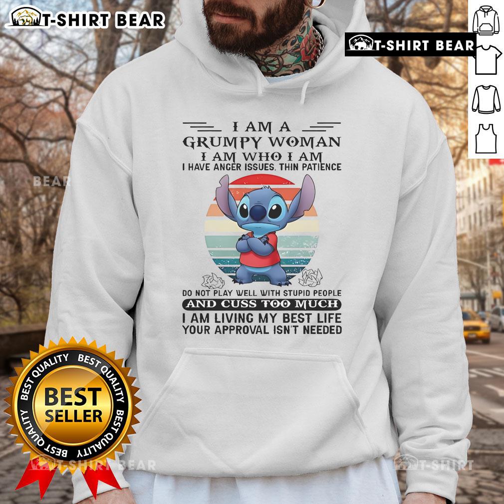 Grumpy woman wearing a 'I Am Grumpy' hoodie showcasing humor and personality with a stylish top-stitch design.