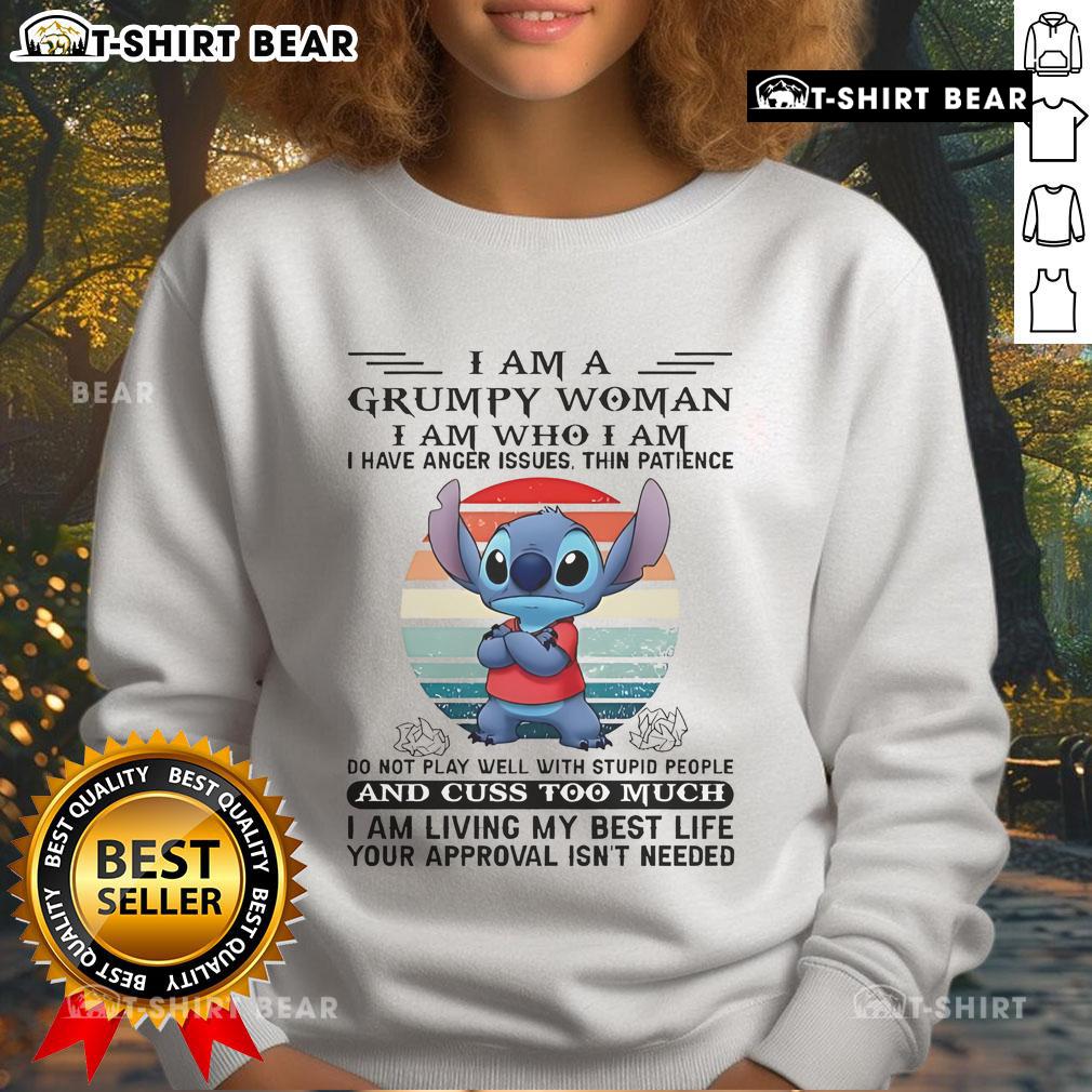 Grumpy woman wearing 'I Am Grumpy' sweatshirt, showcasing humor about anger issues and personality.