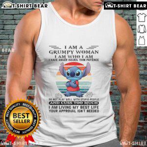 Alt Text: Grumpy woman wearing a Top Stitch I Am Grumpy tank top, showcasing anger issues with a bold graphic design.