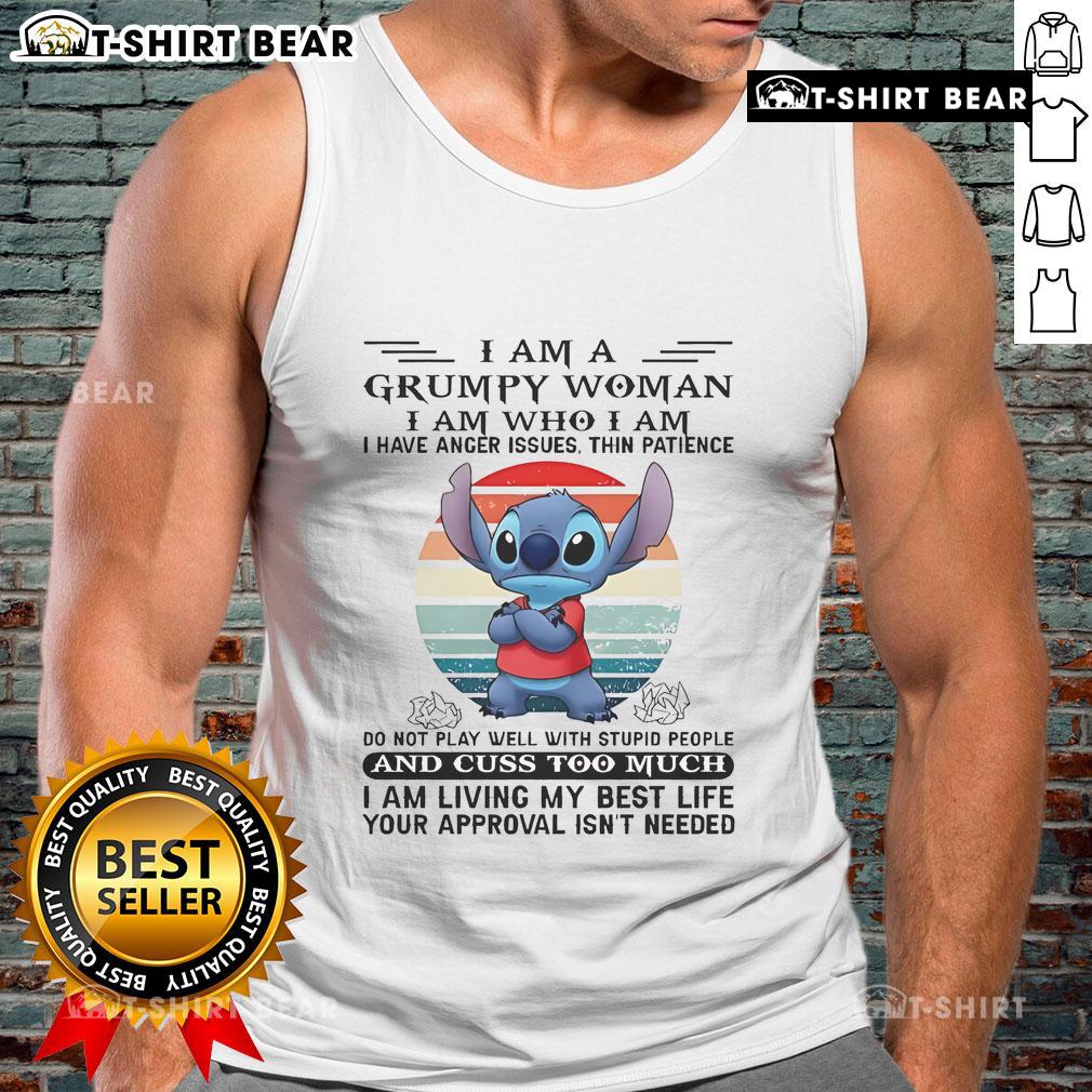 Alt Text: Grumpy woman wearing a Top Stitch I Am Grumpy tank top, showcasing anger issues with a bold graphic design.