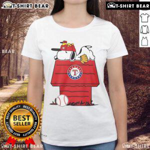 Alt Text: Top Texas Rangers Snoopy Woodstock House Ladies Tee featuring vibrant graphics and a comfortable fit for fans.