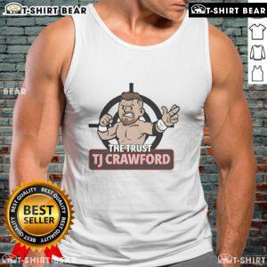 Top-The-Trust TJ Crawford Tank Top displayed on a wooden background with vibrant colors and stylish design.