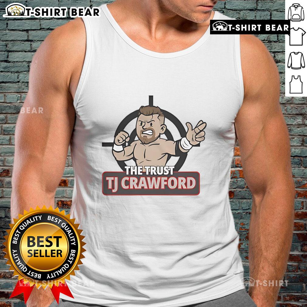 Top-The-Trust TJ Crawford Tank Top displayed on a wooden background with vibrant colors and stylish design.