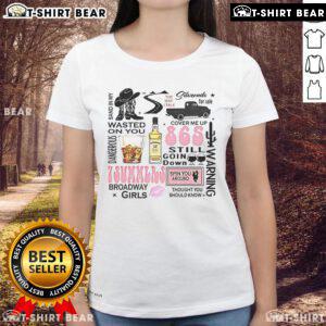 Top Wallen Western Luke Combs Bumper 'Sand In My Wasted On You' Country Music Ladies Tee displayed on a hanger.
