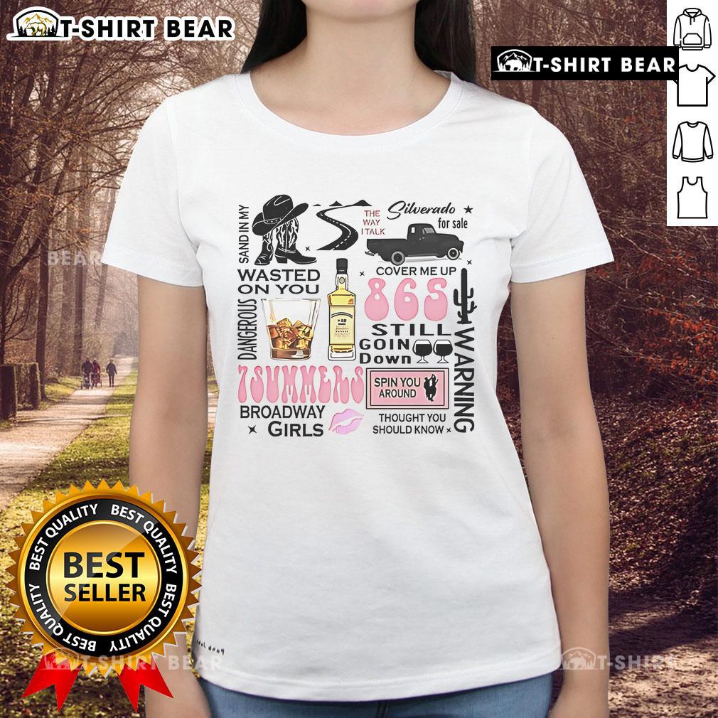 Top Wallen Western Luke Combs Bumper 'Sand In My Wasted On You' Country Music Ladies Tee displayed on a hanger.