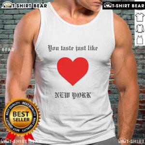 Stylish Top You Taste Just Like New York tank top featuring a vibrant NYC graphic on a casual background.