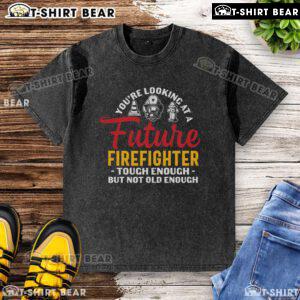 Alt Text: Future firefighter in a washed t-shirt, showcasing strength and youth, ready for a brave career in firefighting.