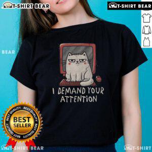 Alt Text: Cute cat sitting on a keyboard with a playful expression, perfect for the I Demand Your Attention ladies' tee design.