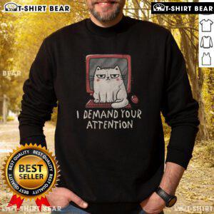 Alt Text: Cute cat on keyboard wearing I Demand Your Attention sweatshirt, perfect for cat lovers and cozy fashion enthusiasts.