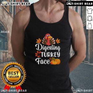 Funny turkey face graphic on a Thanksgiving tank top, perfect for holiday gatherings and celebrating with humor.
