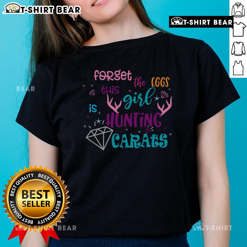 Girl in a funny Easter tee hunting for diamonds instead of eggs, showcasing the 'Forget the Eggs' ladies shirt design.