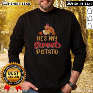 Funny Thanksgiving sweatshirt featuring 'He's My Sweet Potato' turkey design, perfect for holiday celebrations.