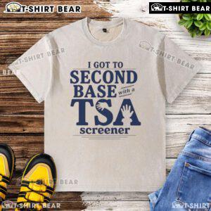 Alt Text: Funny I Got To Second Base With A TSA Screener washed t-shirt featuring humorous graphics and playful text design.