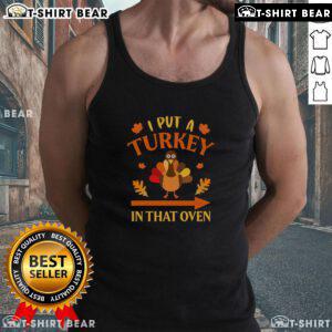Funny Thanksgiving tank top featuring 'I Put A Turkey In That Oven' design for festive holiday celebrations.
