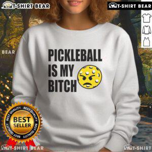 Funny pickleball sweatshirt featuring the phrase 'Pickleball is my b*tch' in bold, playful lettering on a cozy design.