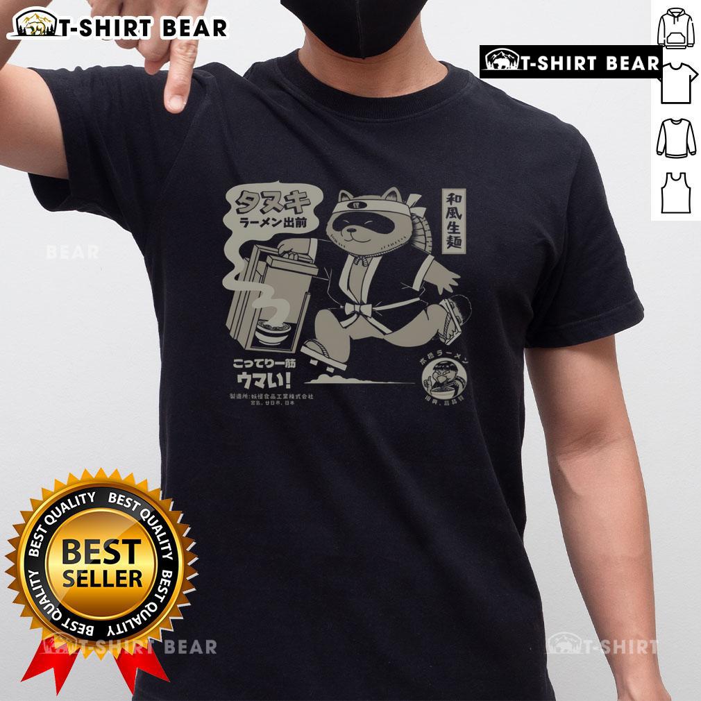 Funny retro Japanese tanuki ramen delivery noodle T-shirt featuring a playful tanuki with noodles and chopsticks design.