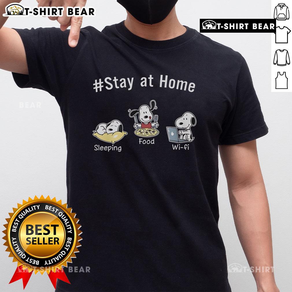 Alt Text: Funny Snoopy Stay At Home Sleeping Food Wi-Fi Peanuts T-Shirt featuring Snoopy lounging with snacks and Wi-Fi symbols.