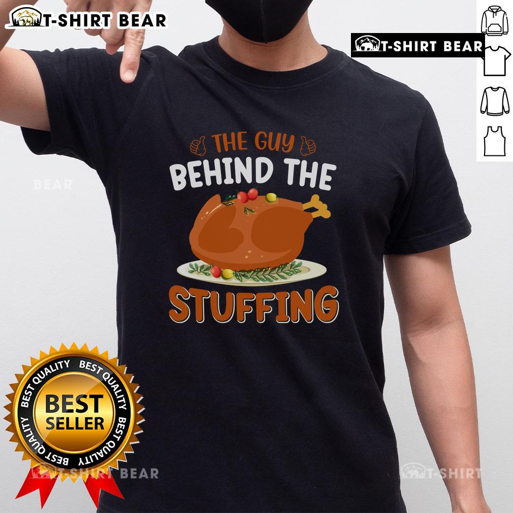 Funny Thanksgiving T-Shirt featuring 'The Guy Behind The Stuffing' design, perfect for holiday gatherings and festive cheer.