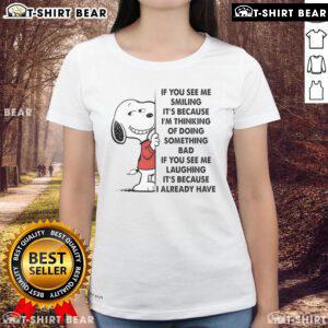 Good Snoopy tee for ladies featuring a playful quote about mischief and smiling, perfect for casual wear.