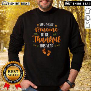 Cozy Thanksgiving sweatshirt with 'Two More Reasons to Be Thankful' design, perfect for celebrating the holiday season.