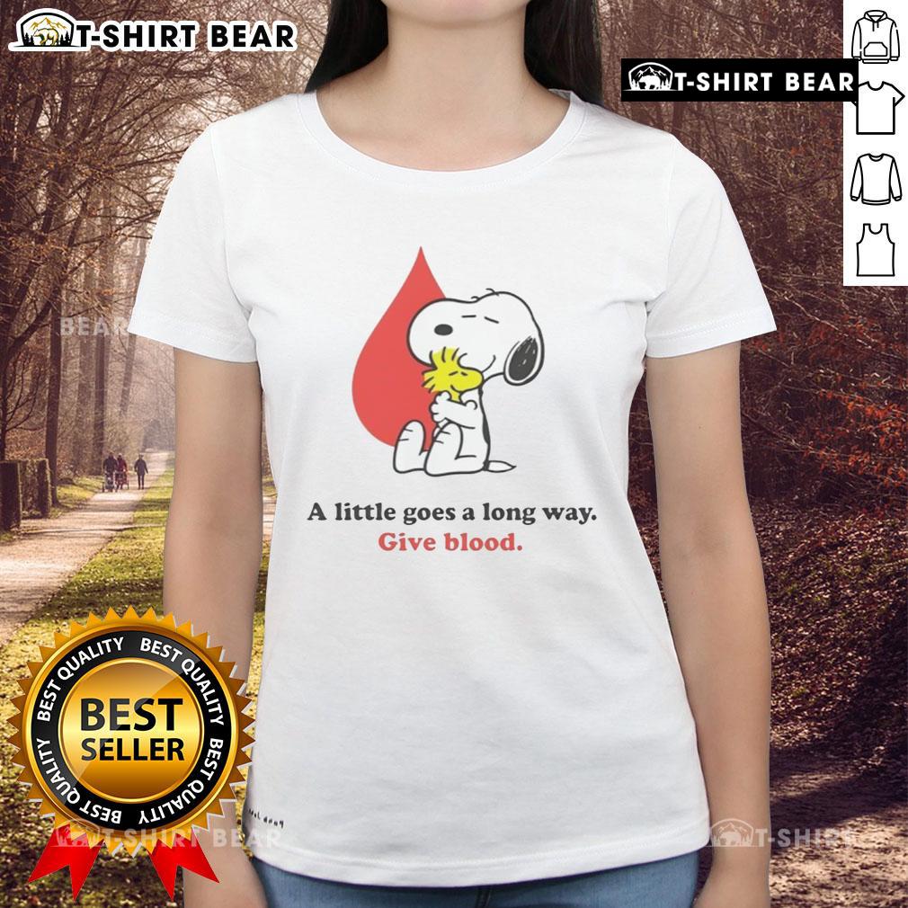 Nice A Little Goes A Long Way Give Blood Snoopy Ladies Tee featuring a vibrant Snoopy design promoting blood donation.