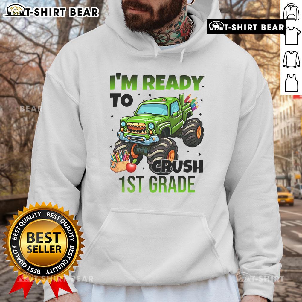 Child wearing a 'Nice I'm Ready to Crush 1st Grade' monster truck hoodie, smiling and ready for school adventures.
