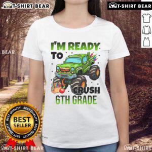 Girl wearing 'I'm Ready to Crush 6th Grade' monster truck tee, showcasing a fun and bold design for kids' apparel.