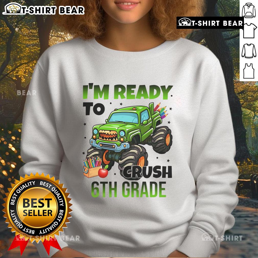 Boy wearing a Nice I'm Ready to Crush 6th Grade Monster Truck sweatshirt, showcasing a fun and vibrant design.