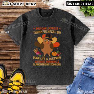 Turkey washed t-shirt expressing thankfulness without harm, featuring a playful design for Thanksgiving celebrations.