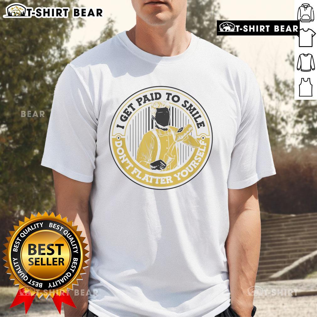 Alt Text: Official I Get Paid To Smile Don't Flatter Yourself T-Shirt featuring bold text design on a casual black tee.