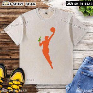 Official New WNBA Logo sex toy meme printed on a washed t-shirt, showcasing humor and sports culture.