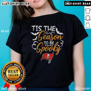Official Tis The Season To Be Spooky Tampa Bay Buccaneers Ladies Tee featuring festive Halloween design and team logo.