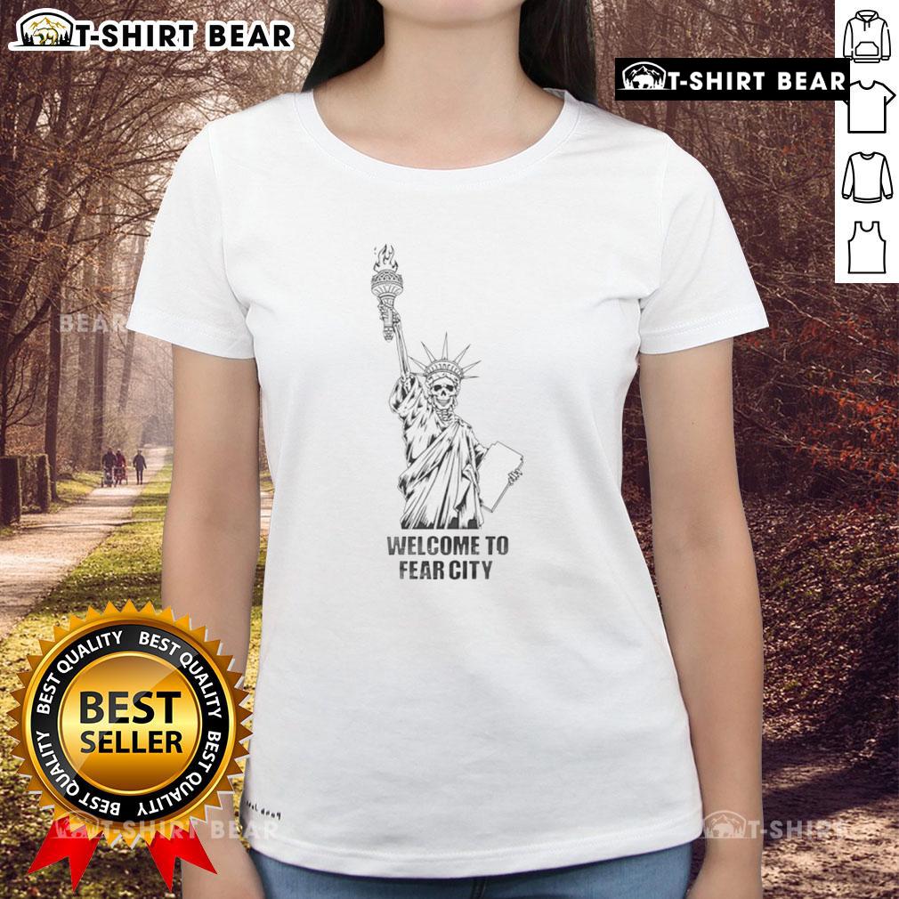 Alt Text: Fear City Statue of Liberty skeleton ladies tee featuring a unique design for Halloween enthusiasts and horror fans.
