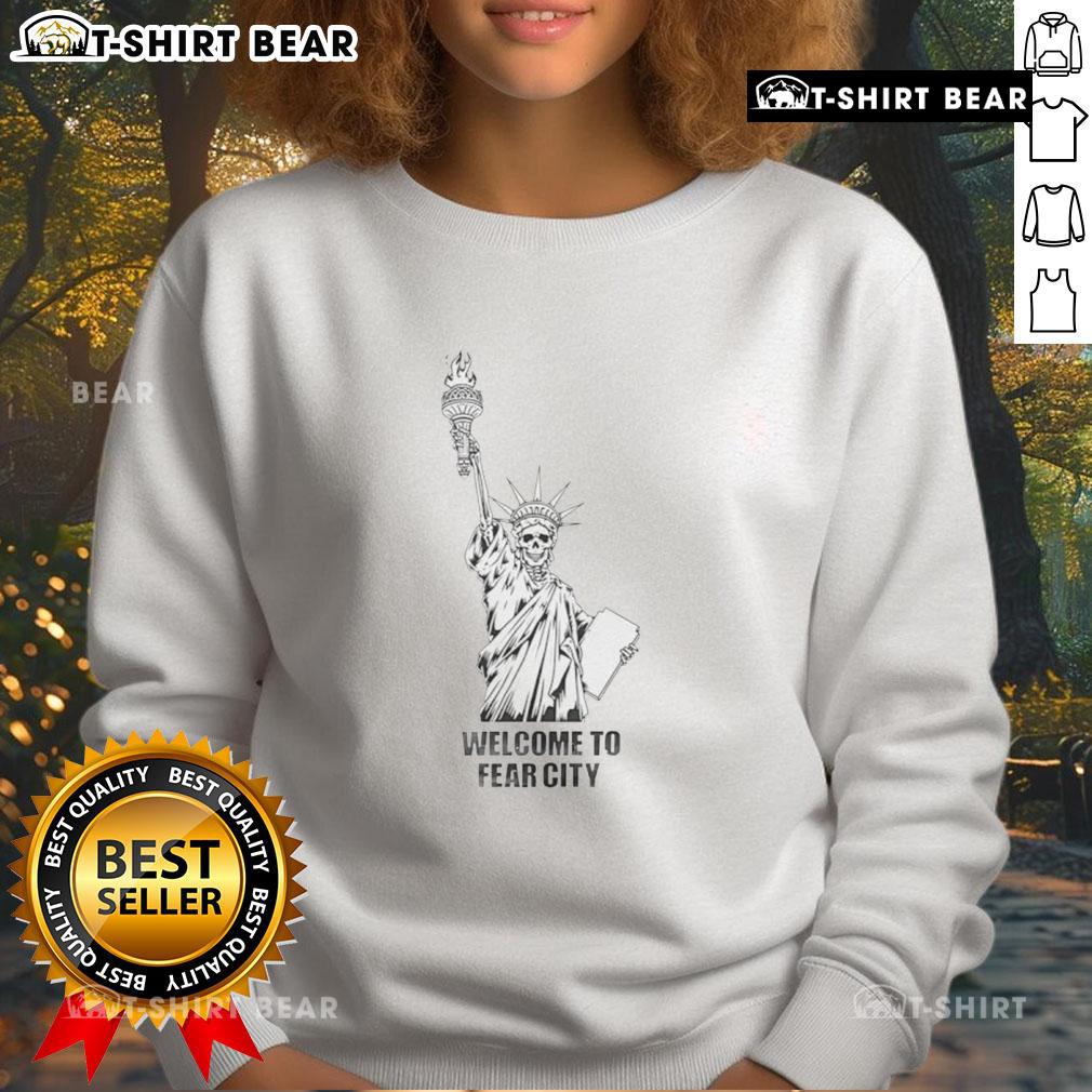 Alt Text: Official Welcome to Fear City sweatshirt featuring a skeleton version of the Statue of Liberty design.