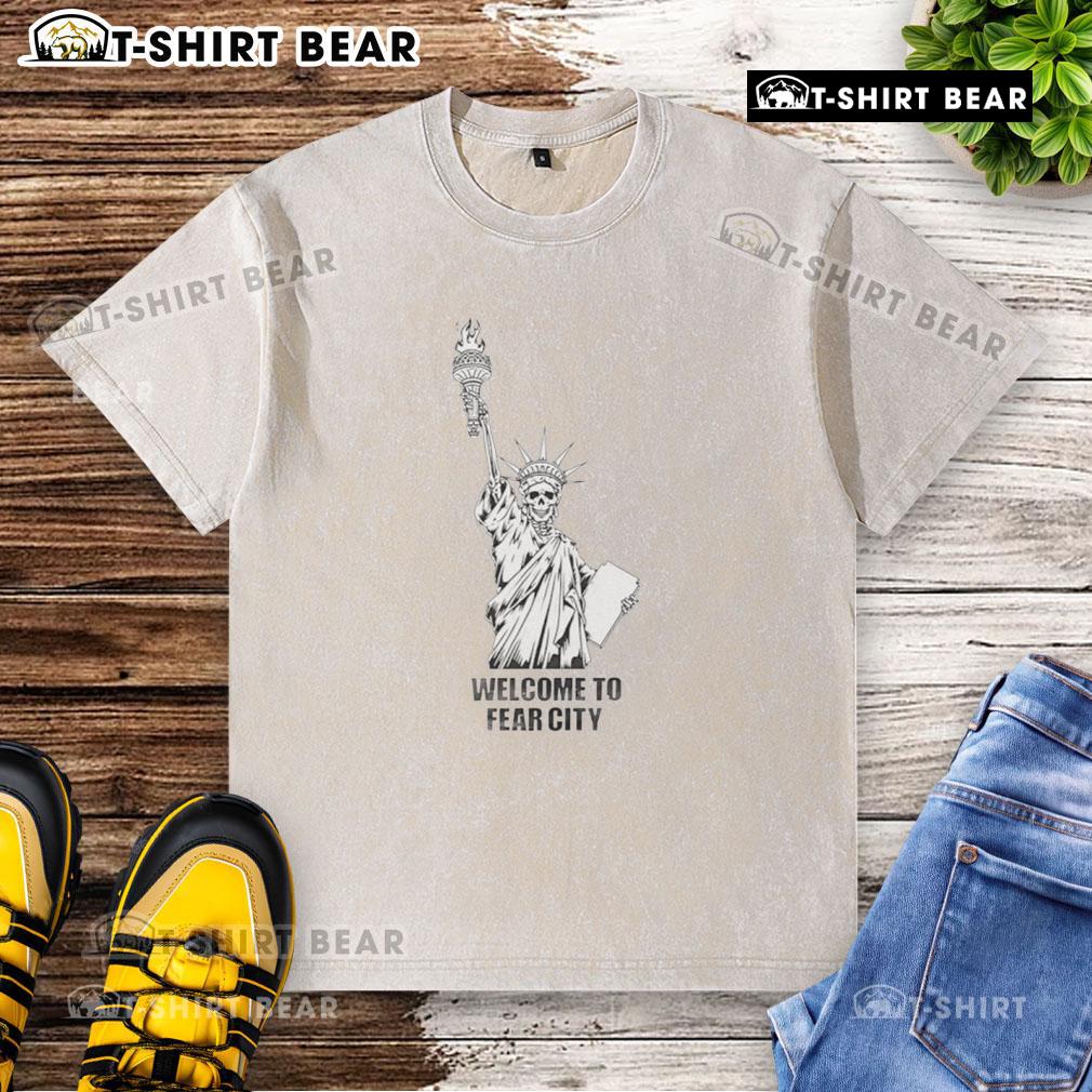 Official Welcome to Fear City T-shirt featuring a skeleton Statue of Liberty design, perfect for Halloween enthusiasts.