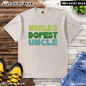 Official Worlds Dopest Uncle washed t-shirt featuring bold graphic design, perfect for casual wear and gifts.