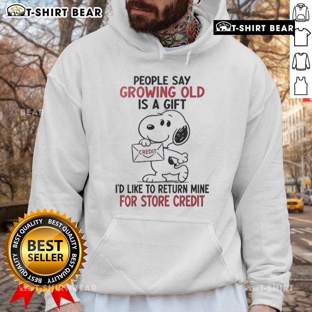 Original Snoopy hoodie featuring 'Growing old is a gift, I'd like to return mine for credit' design in vibrant colors.