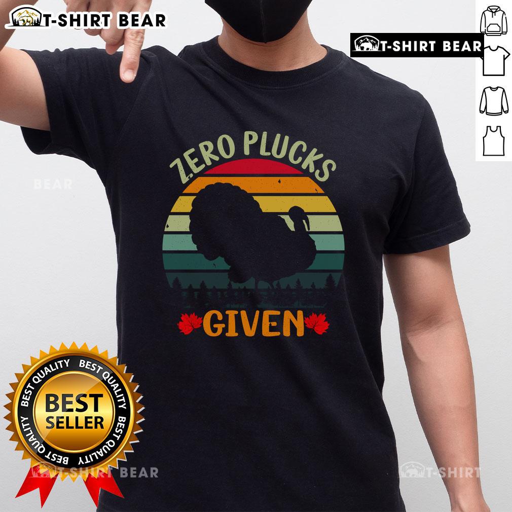 Alt Text: Original Zero Plucks Given T-Shirt featuring a bold graphic design, perfect for casual wear and expressing personality.