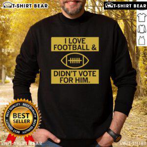 Premium I Love Football And Didn't Vote For Him Sweatshirt in cozy fabric, perfect for football fans and casual wear.