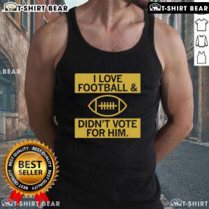 Premium I Love Football And Didn't Vote For Him Tank Top showcasing a stylish design for football fans. Perfect for game day!