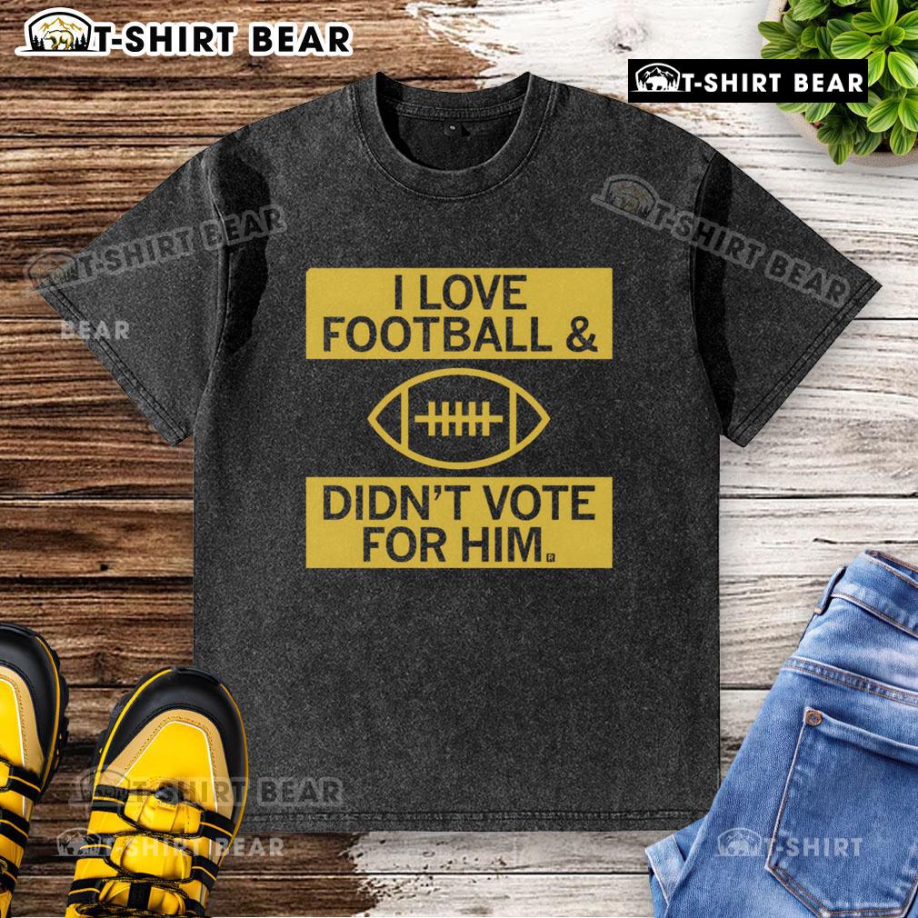 Premium I Love Football and Didn't Vote For Him washed t-shirt, perfect for football fans expressing their views.