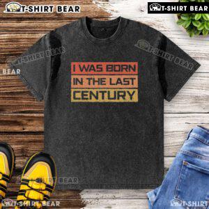 Vintage washed t-shirt featuring 'I Was Born in the Last Century' design, perfect for retro fashion enthusiasts.