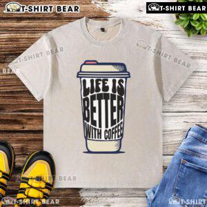 Pretty coffee cup with 'Life Is Better With Coffee' washed t-shirt, perfect for coffee lovers and casual wear enthusiasts.
