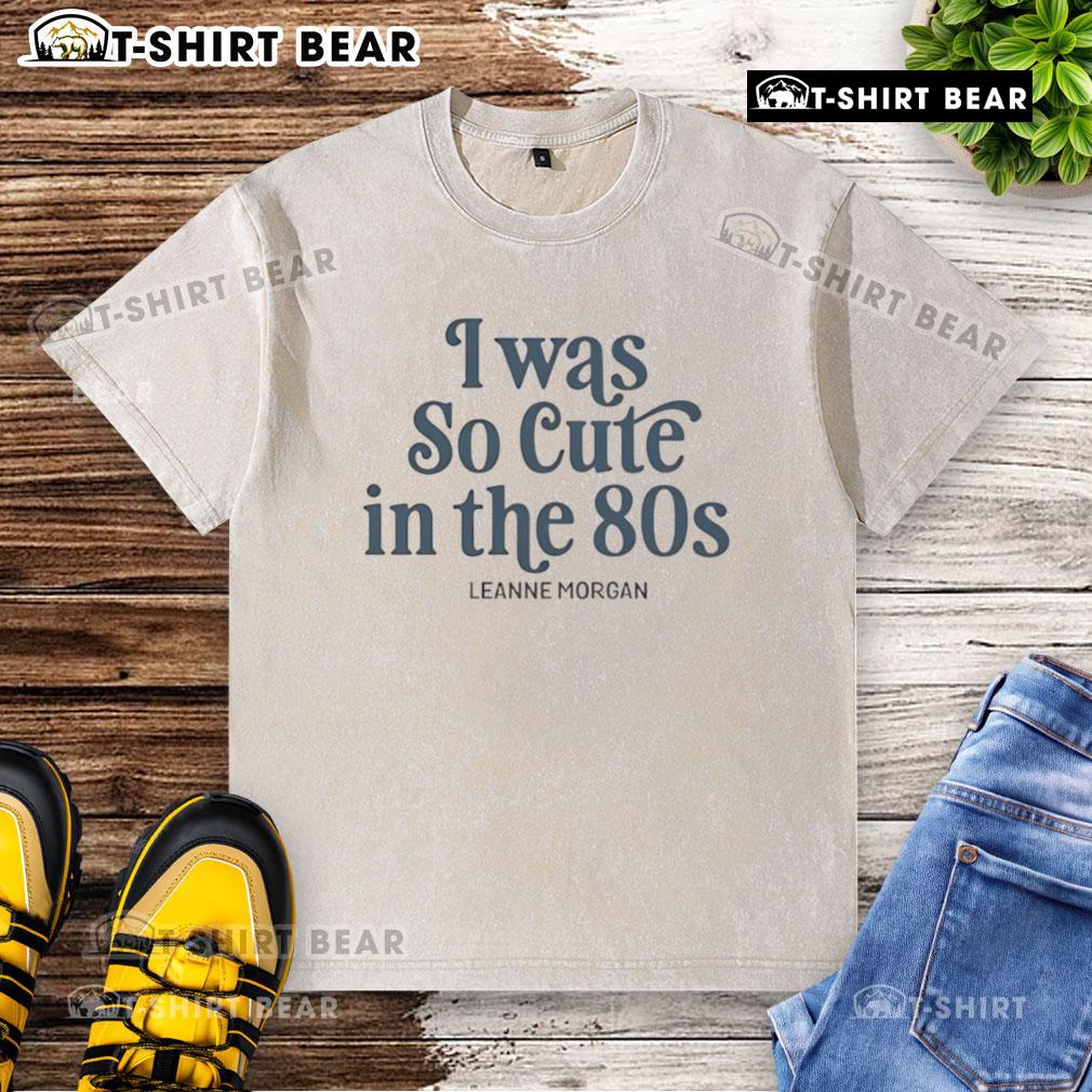 Leanne Morgan wearing a vintage washed T-shirt, showcasing her cute 80s style in a charming outdoor setting.
