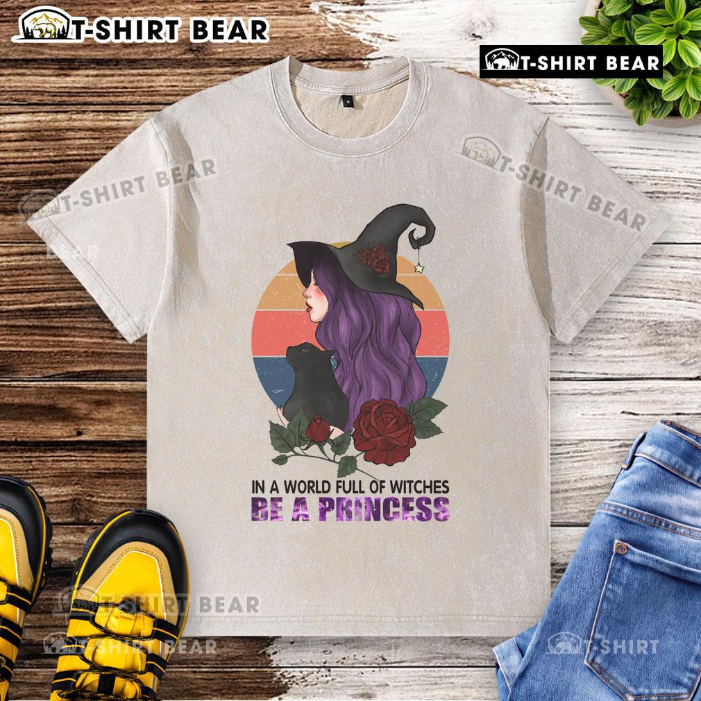 Pretty in a World Full of Witches Be a Princess Halloween washed t-shirt, perfect for festive fall celebrations.
