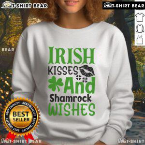 Cozy Pretty Irish Kisses and Shamrock Wishes sweatshirt featuring festive green design, perfect for St. Patrick's Day celebrations.