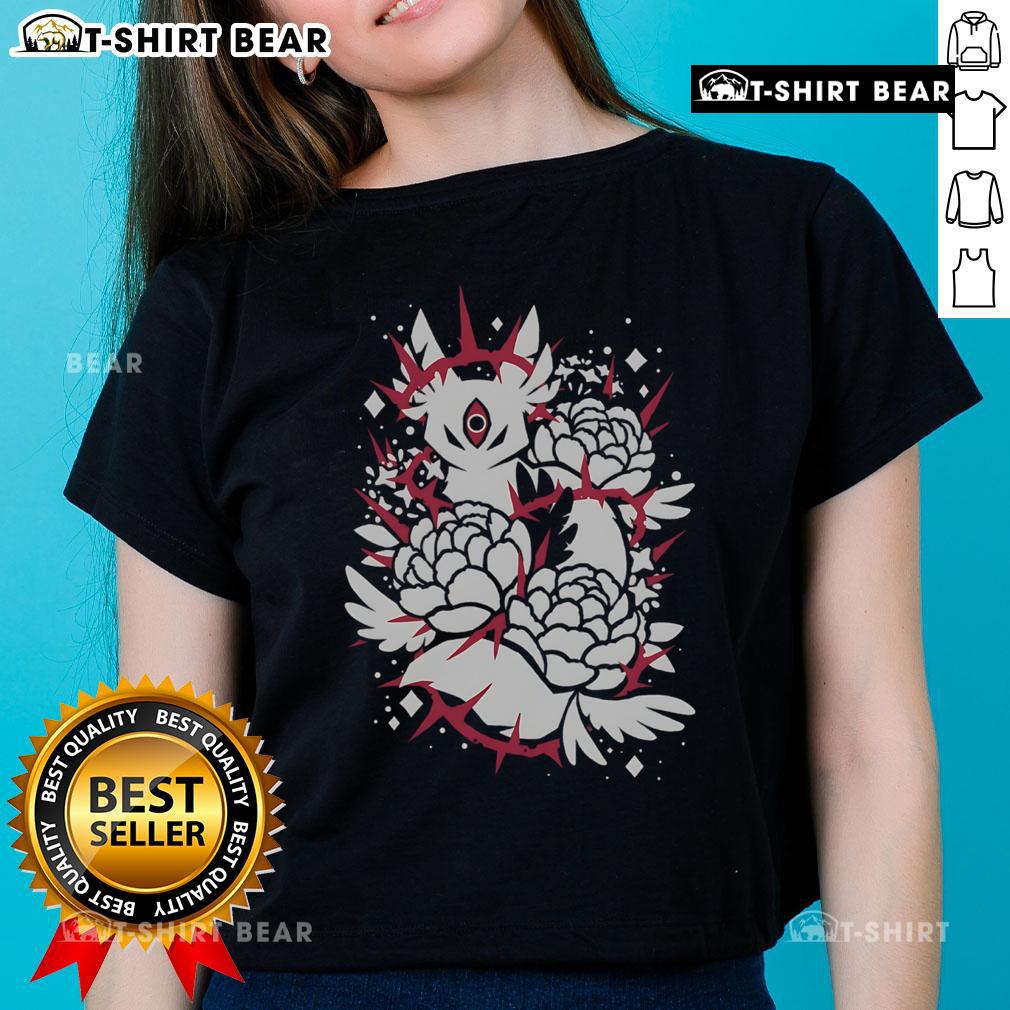 Stylized mythical creature on a ladies tee, promoting softness and comfort in a unique fashion statement.