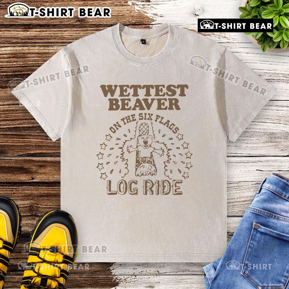 Alt Text: Pretty wet beaver on a log ride at an amusement park, showcasing a washed t-shirt and splashes of water.
